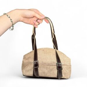 Chic tan shoulder bag with brown leather straps